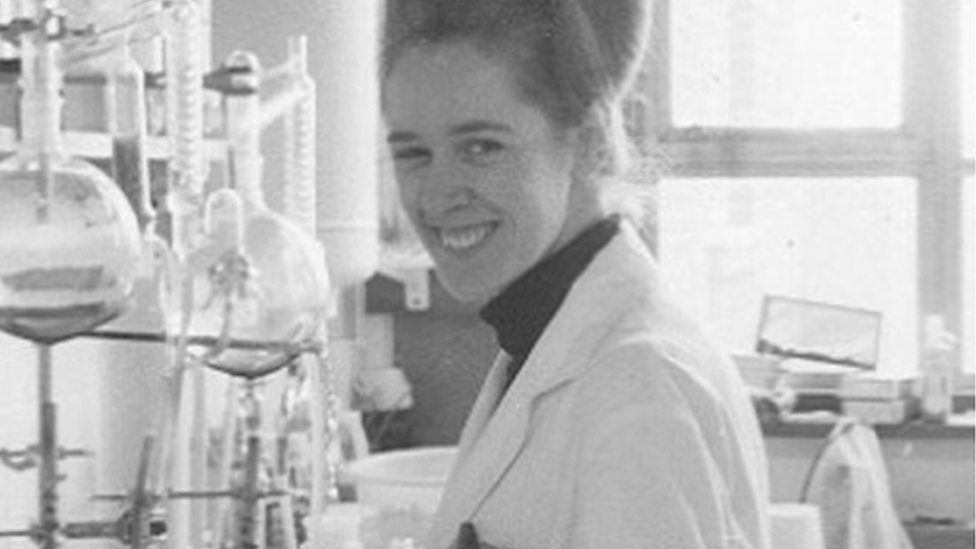 Black and white photo of Jean Purdy in a laboratory