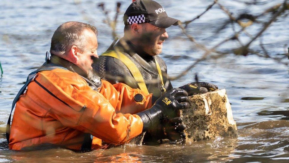 Divers recover bridge stone