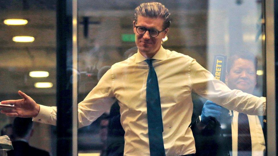 Alex van der Zwaan goes through security at the U.S. District Court after arriving for his sentencing in Washington, D.C., U.S., April 3, 2018