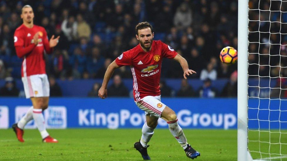 Juan Mata of Manchester United celebrates as he scores their third goal during the Premier League match between Leicester City and Manchester United at The King Power Stadium on 5 February