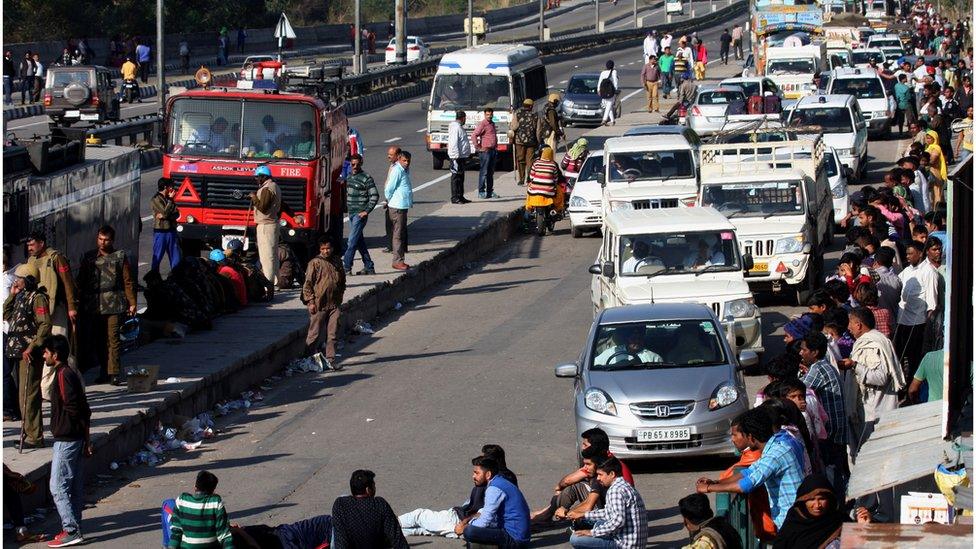 Jat protesters block the highway in the north Indian state of Haryana