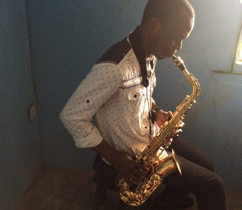 Joseph Shaibu plays the saxophone at the Peter King College of Music, Lagos