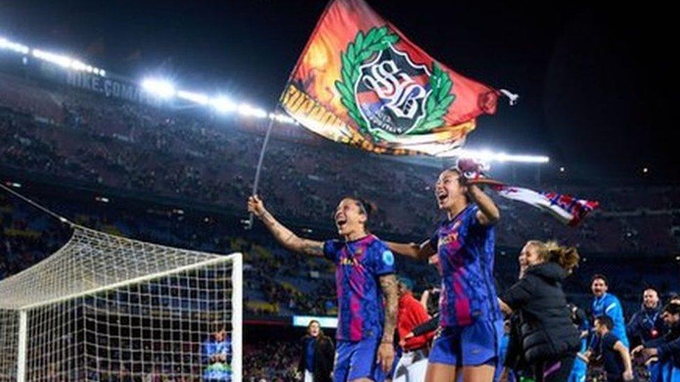 Players celebrate at Nou Camp