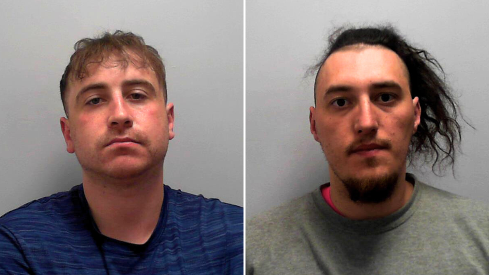 Two custody pictures shown side by side. On the left, a person with short, light brown hair wearing a blue shirt. On the right, a person with longer, dark hair shaved on one side, wearing a grey shirt. Both are photographed against a plain, light background.