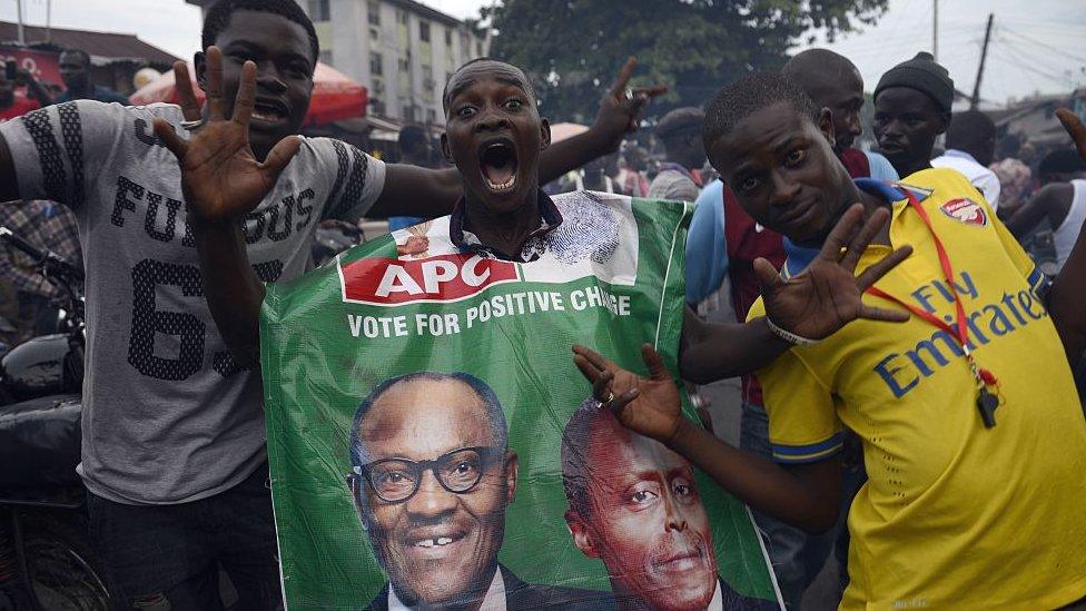 Supporters of Nigeria's Muhammadu Buhari celebrate his election in March 2015