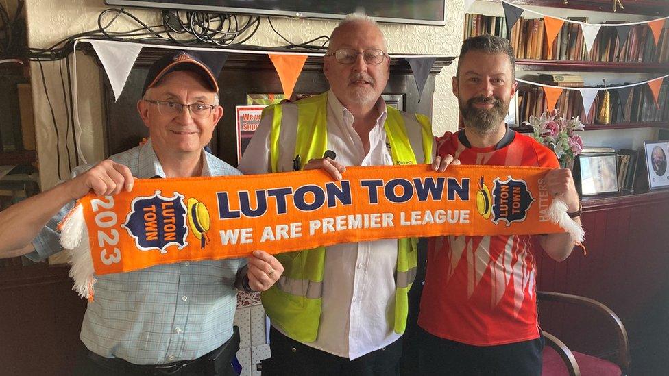 John Pyper (left), middle Tony Murray chairman of Luton Town Supporters Trust and Mike Fanning (right), at the Bricklayers Arms, Luton