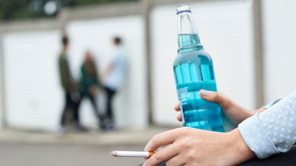 Teenager drinking alcohol