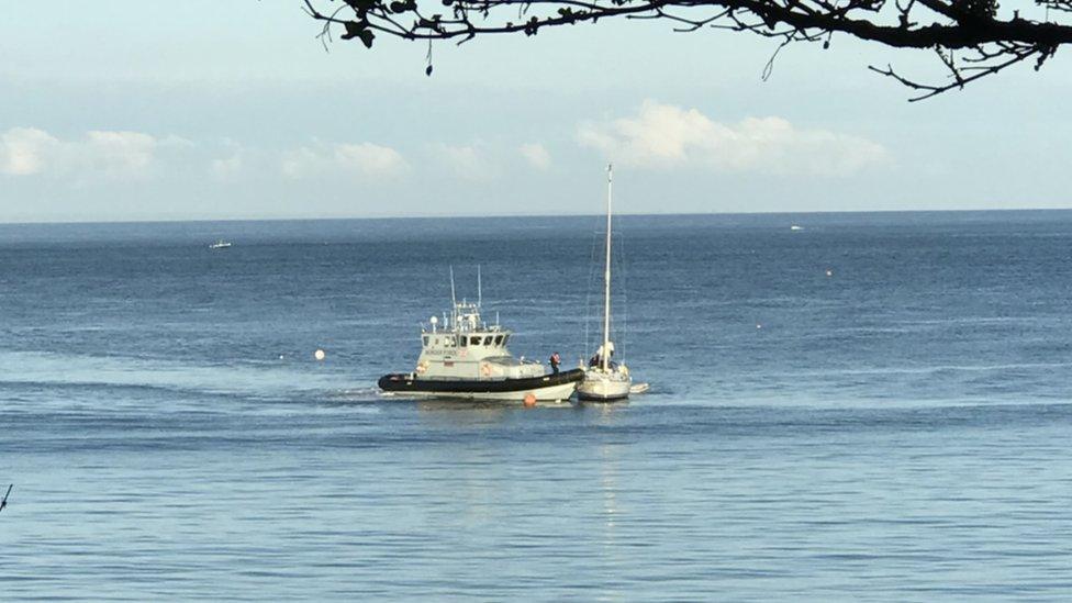 Yacht being boarded by border agents