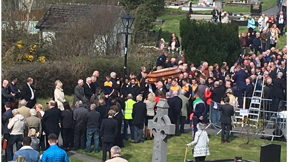 Mourners paying their respects to 'Big Tom' after his funeral in County Monaghan on Friday morning