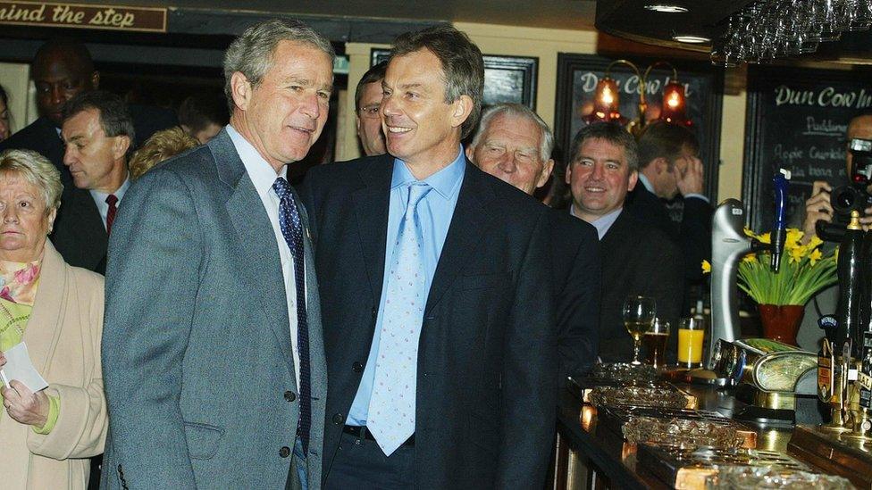 President George W Bush and Prime Minister Tony Blair in a pub in Sedgefield in 2003