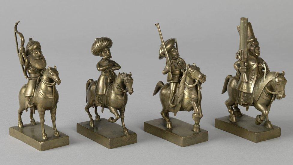 A set of small brass military figures presented to the Prince during hisvisitto Madras in South India