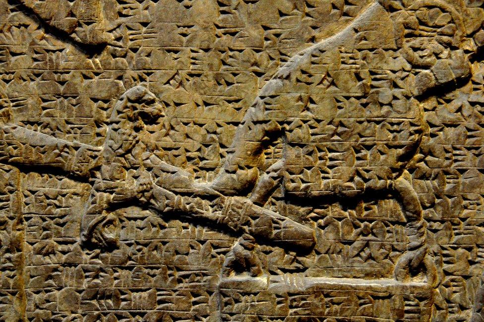 A cuneiform text written in Akkadian carved into stone