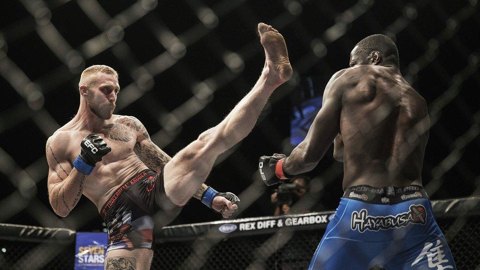 JP Kruger (L) and Yannick Buhati (R) face off during their Middleweight Extreme Fighting Championship title match on May 13, 2016 at Carnival City in Brakpan, South Africa