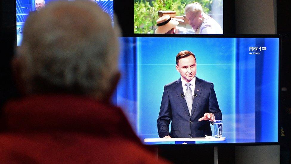 Andrzej Duda (on TV screen) during presidential debate in May 2015