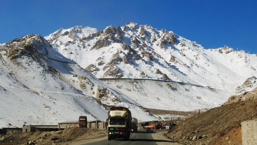 A truck drives down a highway on Salang pass in Parwan province