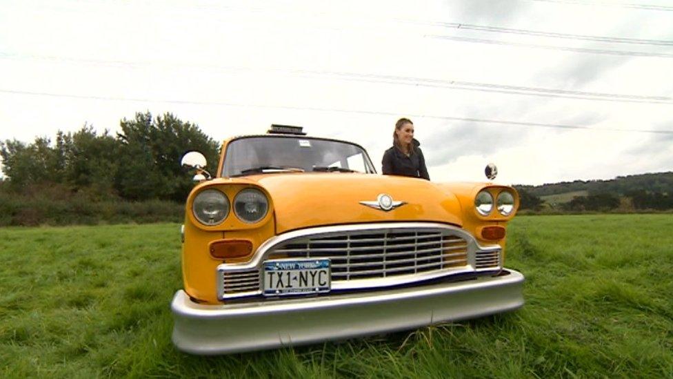 Amy Williams with a yellow taxi at Bathampton Meadows