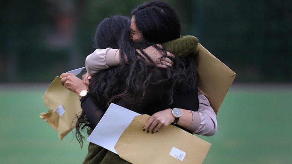 GCSE girls hugging