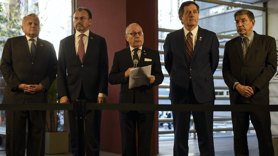 Argentine Foreign Minister Jorge Faurie (C) delivers a statement on Venezuela's situation, along with the Deputy Secretary of State of the United States, John J. Sullivan (L), Mexico's Foreign Secretary Luis Videgaray (2-L), Minister of Foreign Affairs of Chile, Roberto Ampuero (2-R) and G20 representative of Canada, Jonathan Friedon, on the sidelines of the G20 foreign ministers' meeting on 21 May 2018