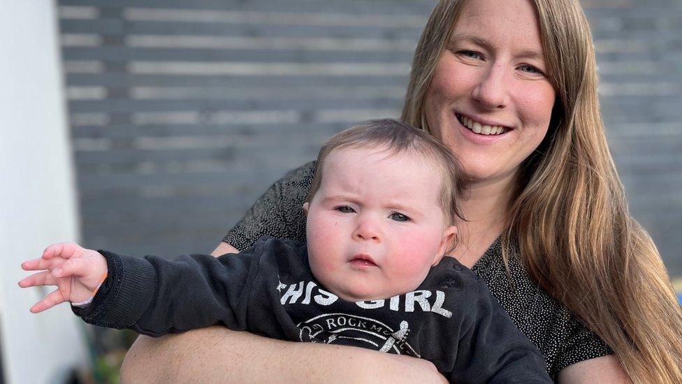 Anna Davies, with five-month-old Manon