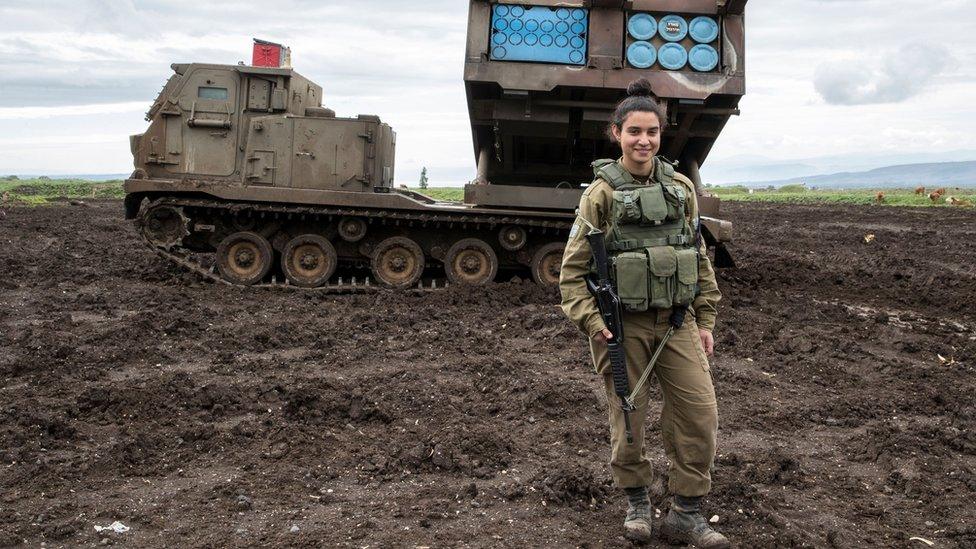 Israeli army sergeant Amit Malekin, 19, commander of a mobile rocket launcher, poses for a picture in the Israeli-occupied Golan Heights near the border between Israel and Syria on February 26, 2018.