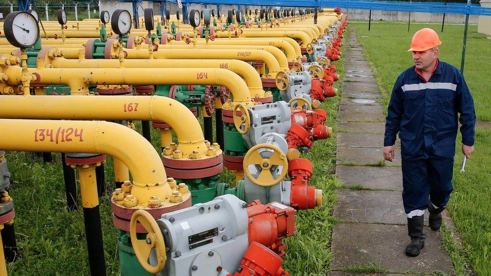 File photo of worker checking equipment at the Dashava gas storage near the western Ukrainian town Stryi