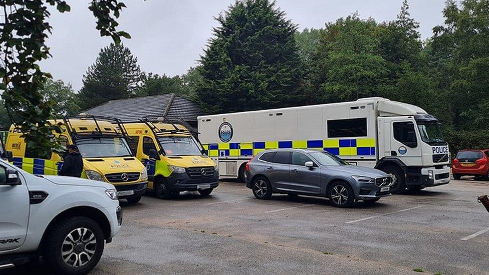 Police vehicles at West Derby Golf Club searching for weapons