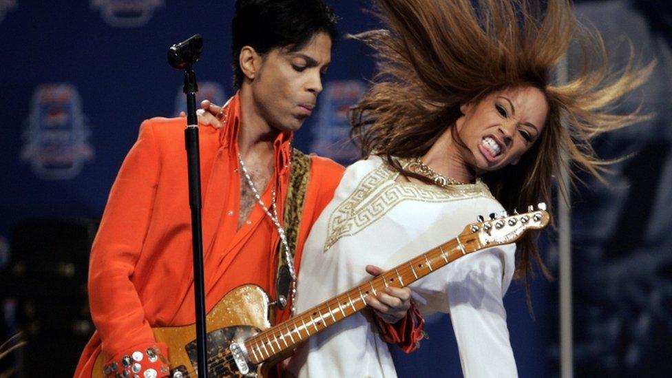 Prince (L) performing in 2007