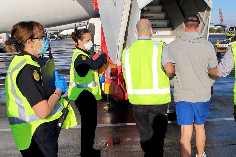 Jones escorted onto plane by border force officials