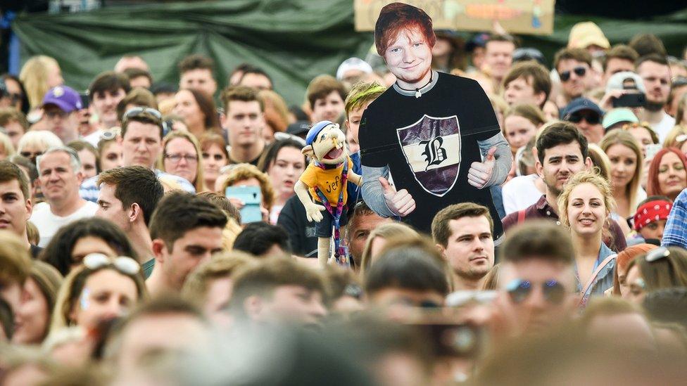 An Ed Sheeran cardboard cut-out in the crowd as he performs during the first day of BBC Music's Biggest Weekend at Singleton Park