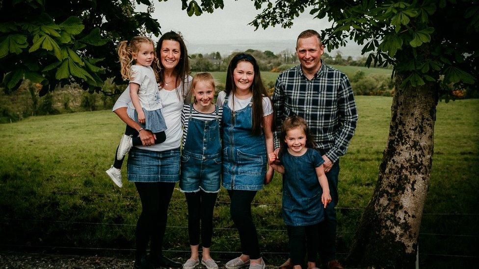 The late Christopher Hamilton with his wife and daughters