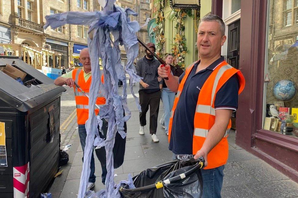 Leaflet litter picker, Chris, in Cockburn Street in Edinburgh