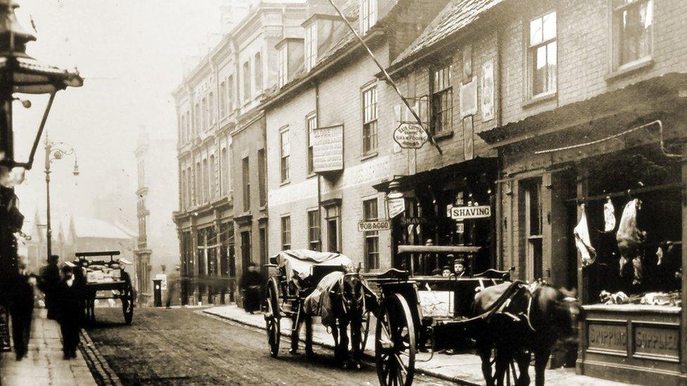 Looking south down Lowestoft High Street in the early 1880s, towards the Globe Inn and Devereux’s building.