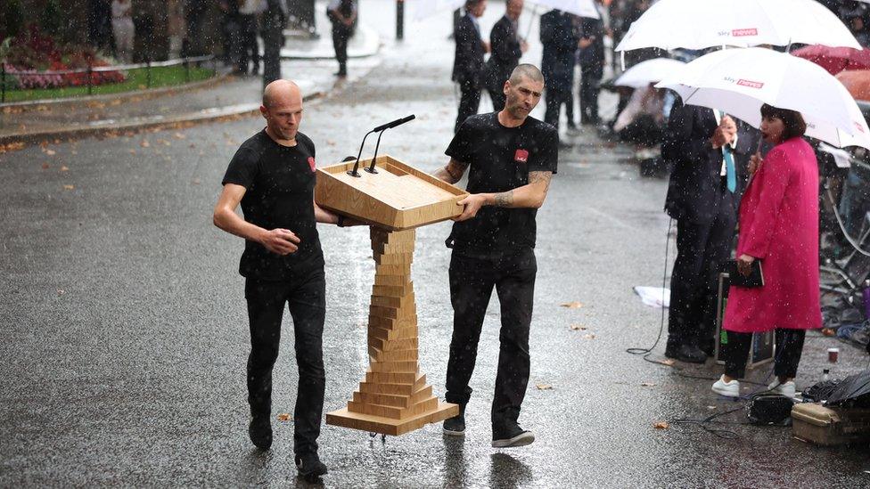 The Downing Street lectern is moved inside