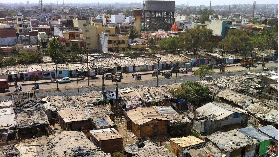 Slum next to the abandoned plant