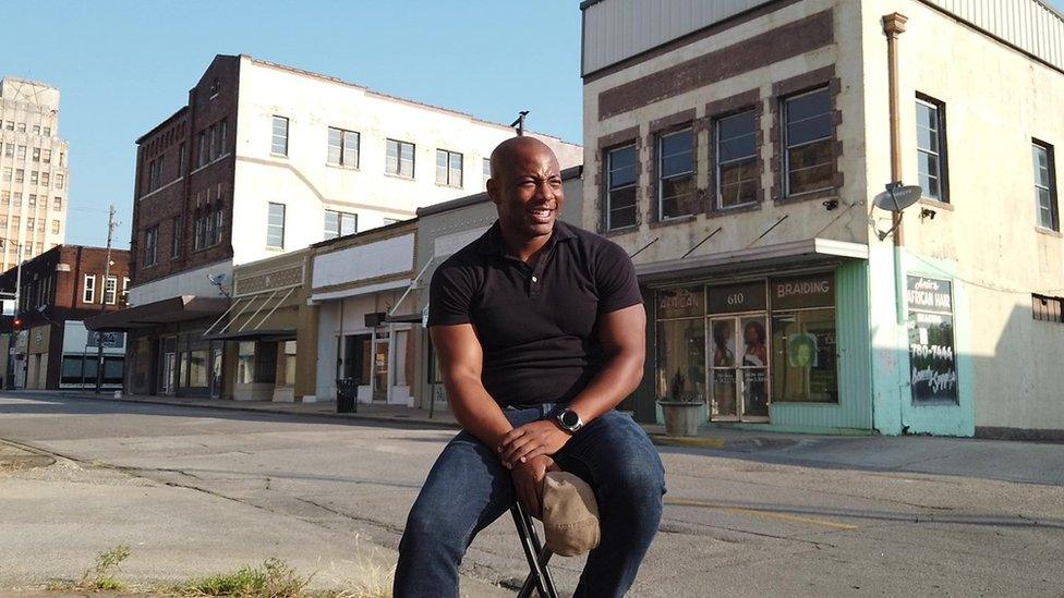 Brian Rice, pictured in front of some of his buildings