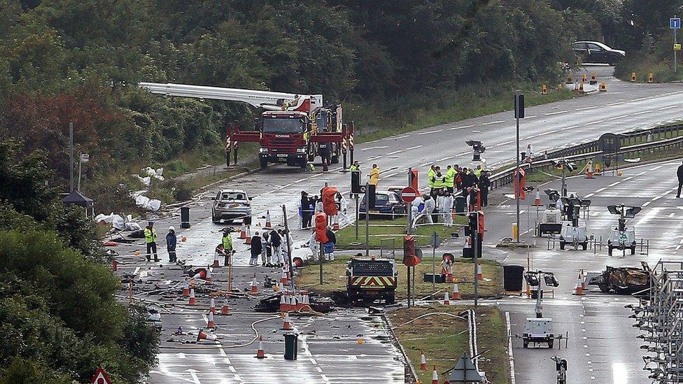 Emergency services working on the A27 in the aftermath of the disaster