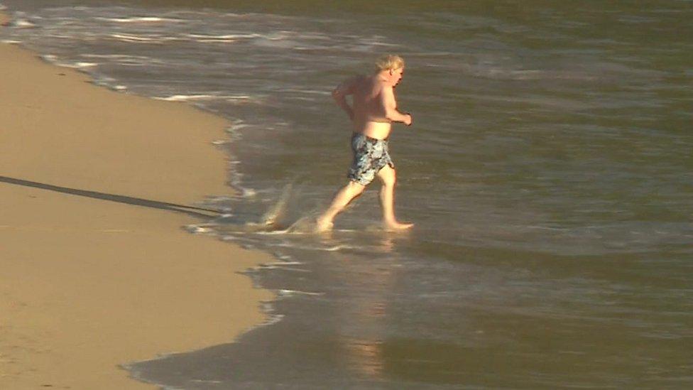 Boris Johnson goes for a swim on Sunday morning