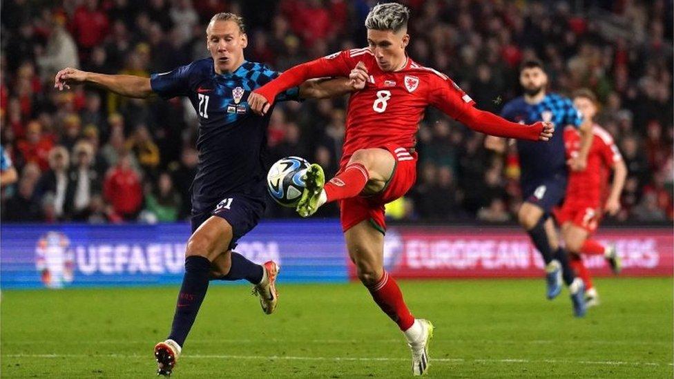 Harry Wilson in action during the match