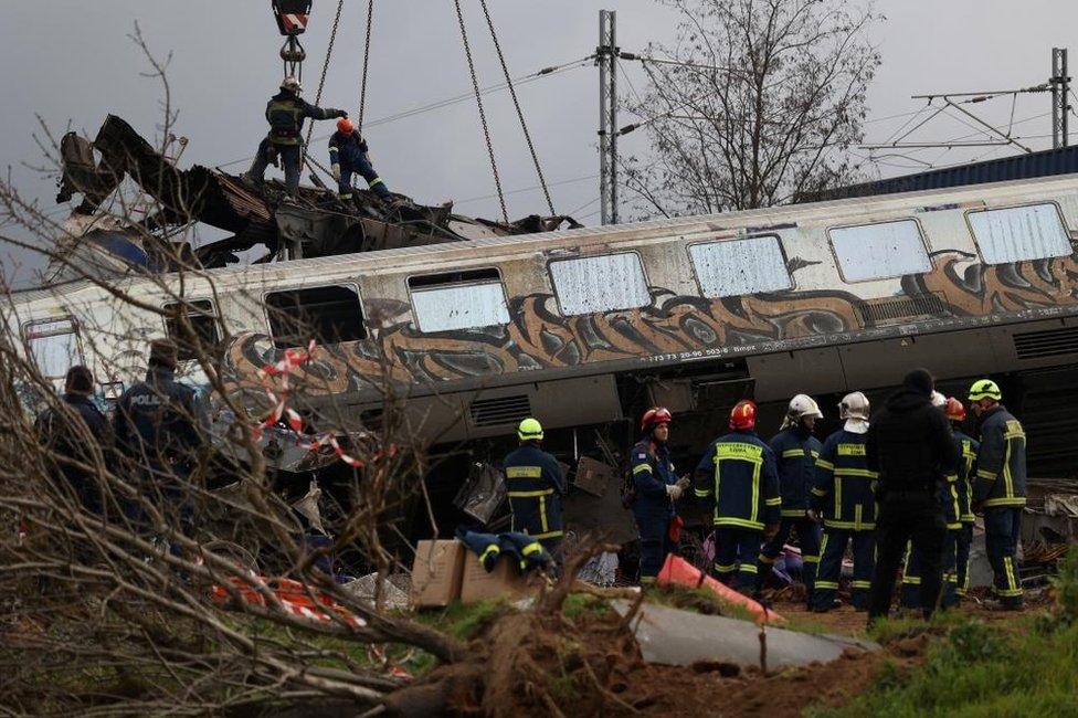 Rescuers operate at the site of a crash.