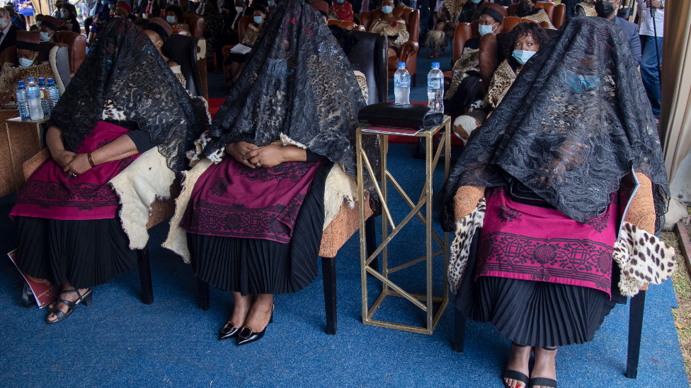 The shrouded queens - the three widows of King Goodwill Zwelithini - at his memorial service in Nongoma, South Africa - 18 March 2021