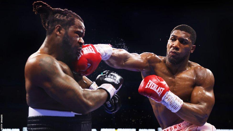 Anthony Joshua lands a right hand on Jermaine Franklin