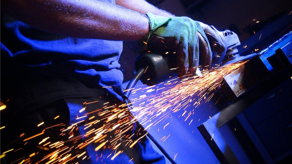 man welding