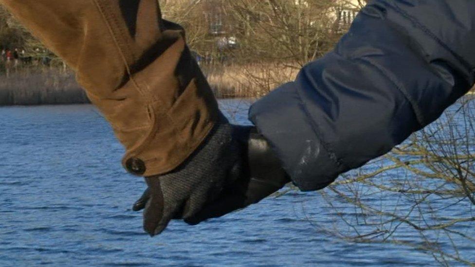 Protesters in Backwell hold hands