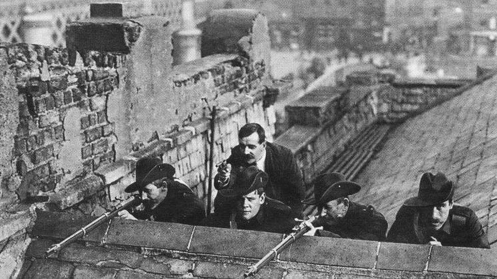 Irish Citizen Army members on the roof of Dublin's Liberty Hall during the Easter Rising