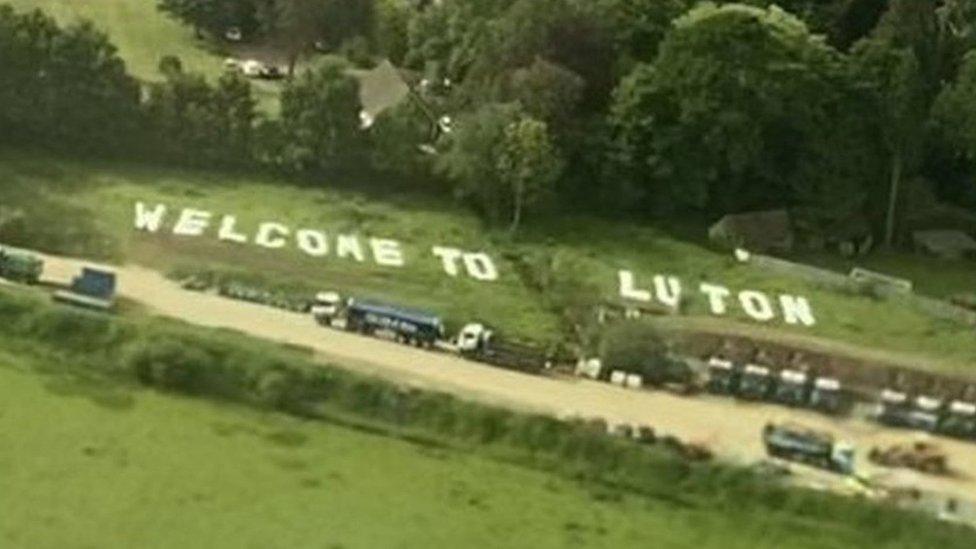 Welcome To Luton Sign at Gatwick Airport