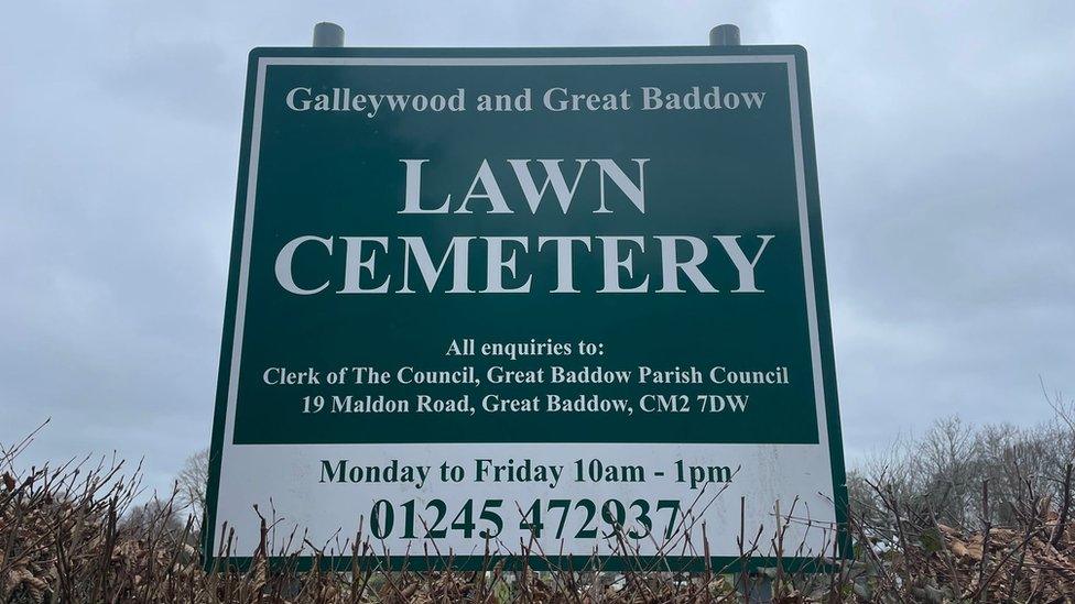 A sign at the cemetery