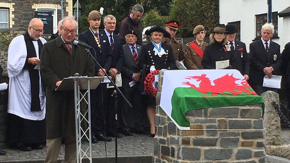 The ceremony unveiling the stone