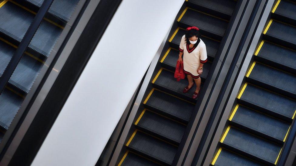 A woman in a shopping centre in Bangkok