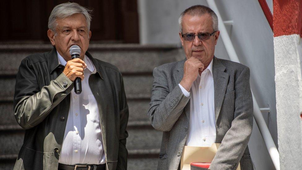 Mexico's President-elect Andres Manuel Lopez Obrador (L) speaks during a press conference next to his appointed Finance Minister Carlos Urzua, at their party's headquarters in Mexico City on July 23, 2018.