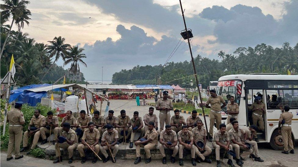 Police seen guarding the port area in Vizhinjam